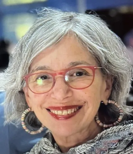Headshot of our teacher, Elizabeth Coleman.