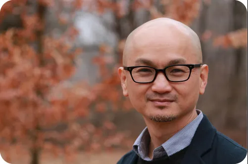 Headshot of our teacher, Dr. Home Nguyen.