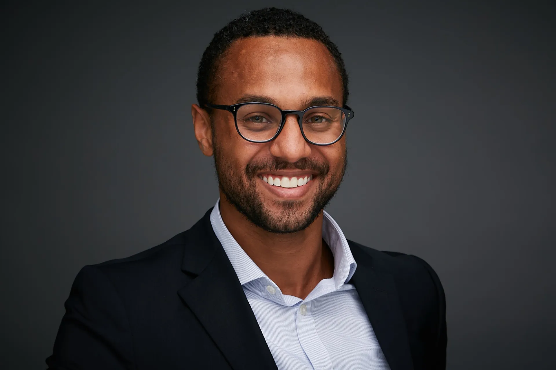 Headshot of our host, Keith Geddings.